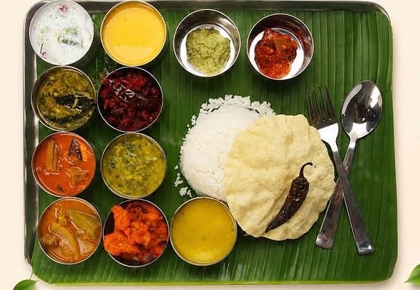 A traditional South Indian thali on a banana leaf